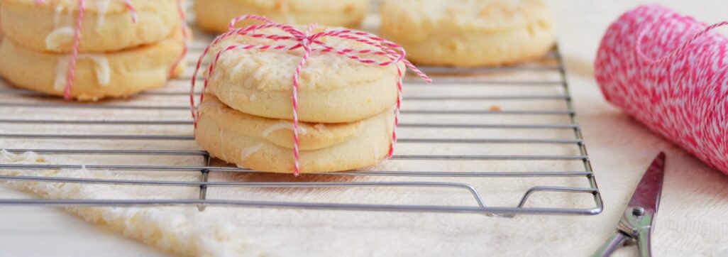 Shortbread cookies wrapped in red and white twine